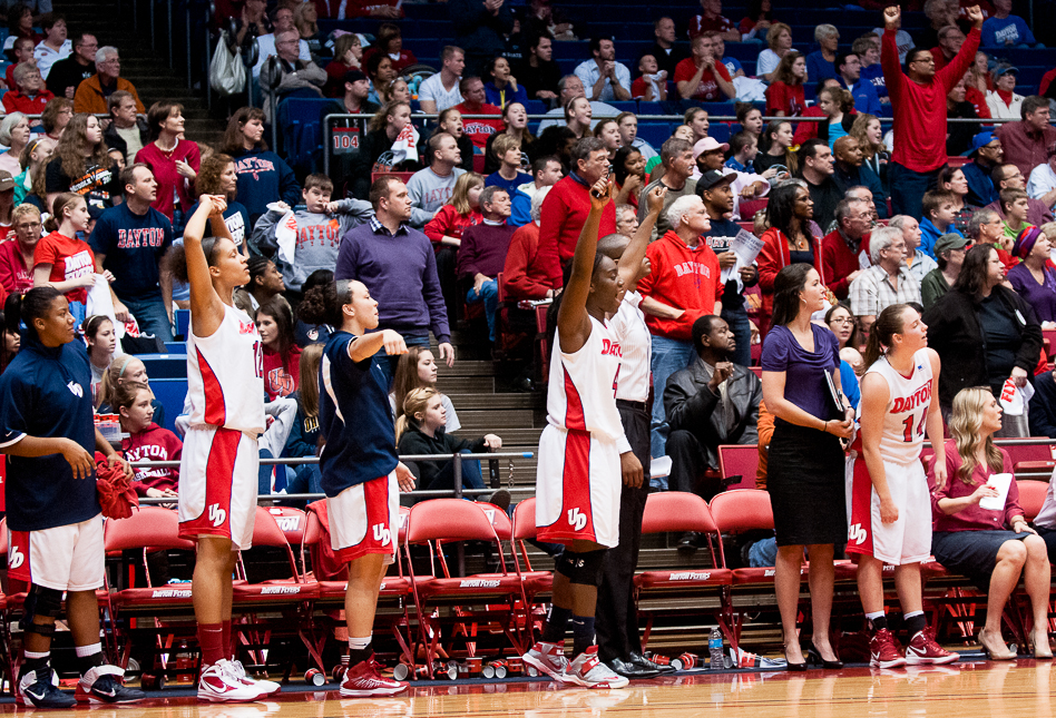 Players on the University of Dayton bench celebrate as the last seconds expire during a game against Florida Atlantic University at UD Arena, Dec. 8, 2012, in Dayton, Ohio. UD won 81-56.